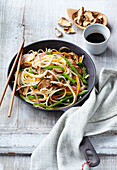 Asian noodles with dried mushrooms and vegetables