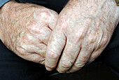 Hands of an elderly man