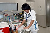 Nurse writes up patient notes