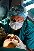 Surgeon prepares to makes a surgical incision