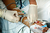 Injecting fluid into catheter