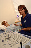 Cardio physiologist using ultrasound