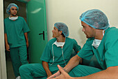 Three surgeons talking