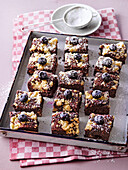 Hazelnut-chocolate cake tray bake with blueberries