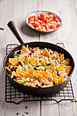 Tex-Mex bake with tortilla chips and BBQ chicken