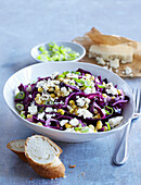 Red cabbage salad with feta cheese and corn