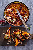 Pumpkin tart with almonds and cranberries