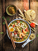 Laksa - coconut soup with rice noodles, prawns and egg from Malaysia