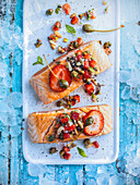 Roast salmon with capers and strawberries