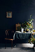 Winter table in front of black wall