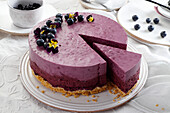 Cream cheese tart with blueberries, sliced
