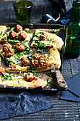 Swedish Köttbullar pizza with spinach, sour cream and cheese