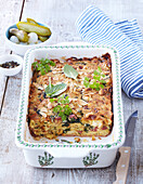 Easter bread pudding with spinach and smoked pork