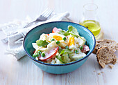 Cauliflower salad with cheese and eggs