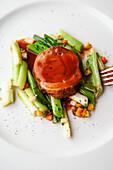 braised lamb with glazed spring onions