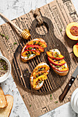 Crostini with cream cheese and grilled nectarine slices