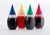Four vials of food coloring