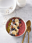 Healthy bowl with raspberry smoothie