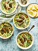 Easter soup with lamb and stuffed vine leaves