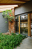 Partially covered landscaping at the Main Building front entrance