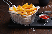 Homemade chips with raspberry ketchup