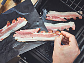 Frying homemade cured bacon