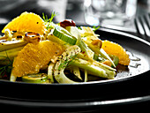 Fennel salad with segmented orange slices and hazelnuts