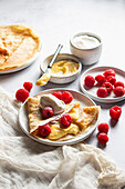 Crepes with raspberries and lemon curd