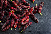 Fresh ripe Mulberries on dark background
