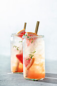 Trendy summer drinks with grapefruit and thyme