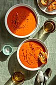 Two bowls of roasted tomato soup