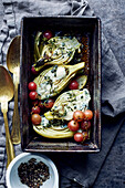 Braised fennel topped with blue cheese, grapes, and thyme