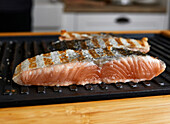 Fresh salmon being grilled