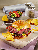 American steak sandwich with guacamole and whiskey sauce