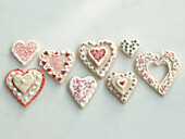 Heart-shaped short pastry with royal icing and sprinkles