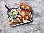 Hot dogs with creamy cabbage topping, mustard and parsley