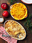 Vegan cooking for Christmas: gratin with saffron, apples, pine and gratin with potatoes and onion