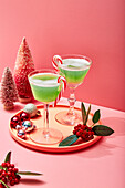 Christmas cocktails decorated with candy canes