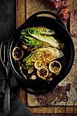 Grilled romaine lettuce with lemon and caper apples