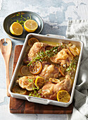 Baked chicken legs with lemons