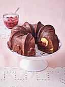 Chocolate bundt cake with curd filling and sour cherries