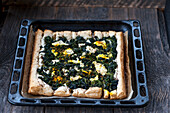 Spinach tart with cheese and turmeric