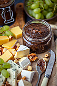 Cheese platter with apple and coffee jam