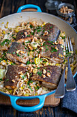 Trout with braised leeks and walnuts