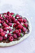 Raspberry pizza with chocolate cream
