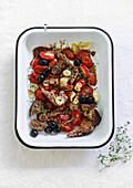 Braised tomato salad with bread and olives