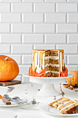 Pumpkin spice cutaway cake on white background