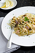 Sicilian spaghetti with tuna and anchovies and lemon