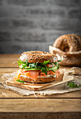 Bagel with avocado, salmon and rocket