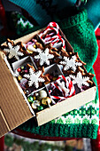 Christmas cookies in star and snowflake shapes in a gift box